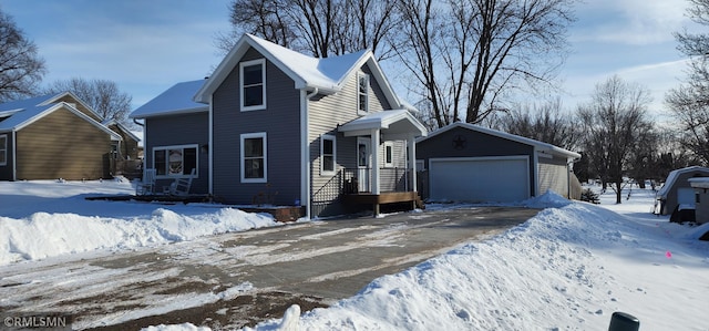 view of front of house featuring an outbuilding and a garage