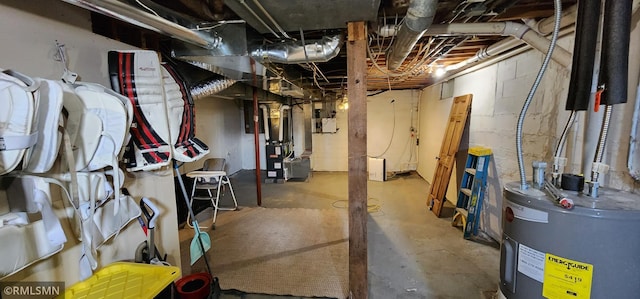 basement with heating unit and electric water heater