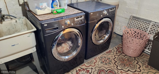 laundry area featuring separate washer and dryer