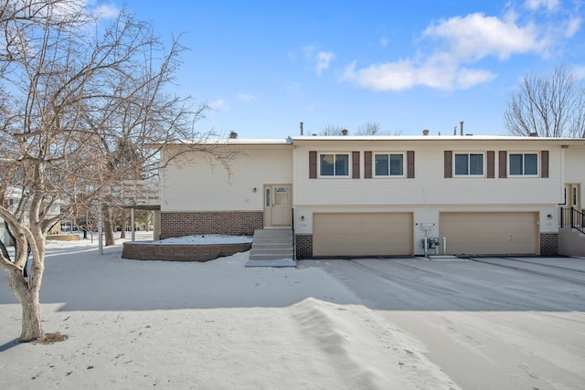 bi-level home featuring a garage