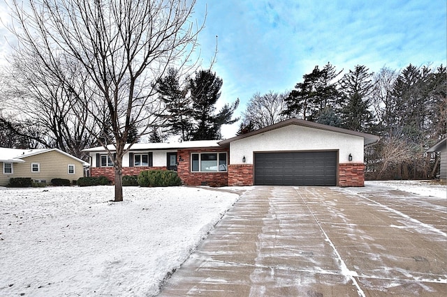 ranch-style home with a garage