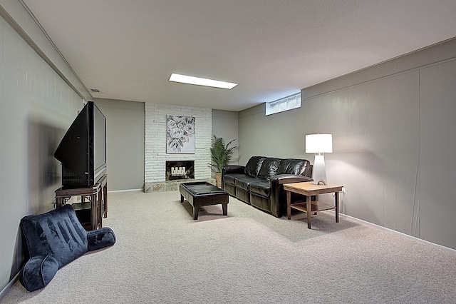 living room featuring a fireplace and carpet