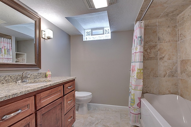 full bathroom featuring vanity, shower / tub combo with curtain, a textured ceiling, and toilet