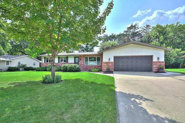 ranch-style house with a garage and a front yard