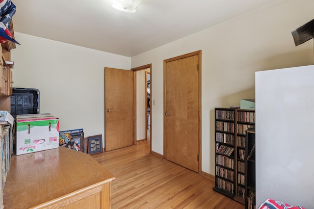 office area with light wood-type flooring