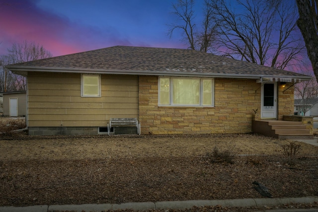 view of property exterior at dusk