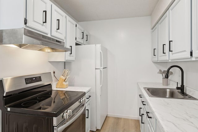 kitchen with under cabinet range hood, white cabinetry, stainless steel electric range oven, and a sink