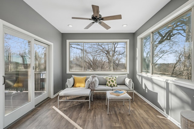 sunroom / solarium with ceiling fan