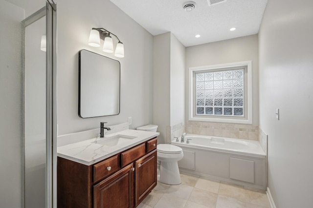 bathroom with recessed lighting, visible vents, toilet, vanity, and a bath