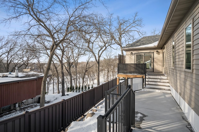 view of snow covered deck