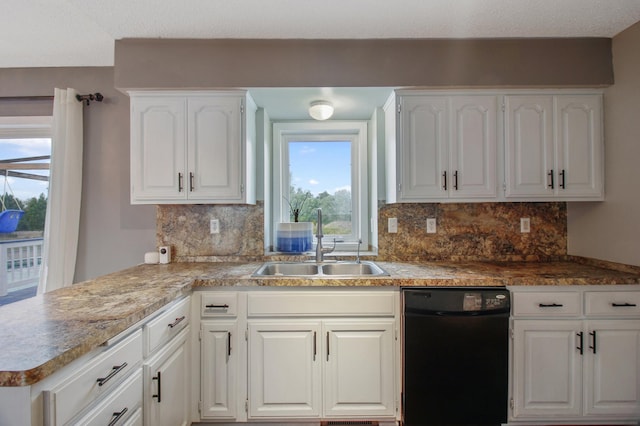 kitchen featuring white cabinetry, black dishwasher, sink, and decorative backsplash