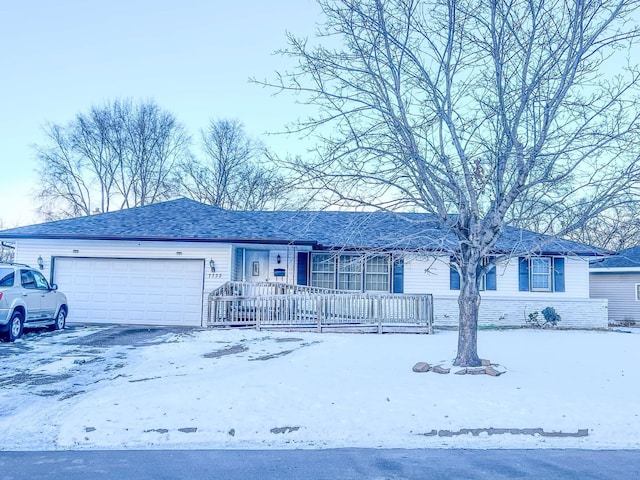 ranch-style house with a garage