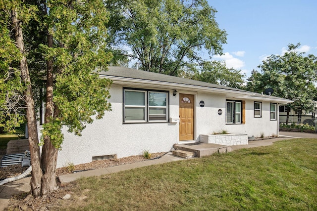 4812-4814 Idaho Ave N, Crystal, MN 55428 - view of front of property with a front yard and stucco siding