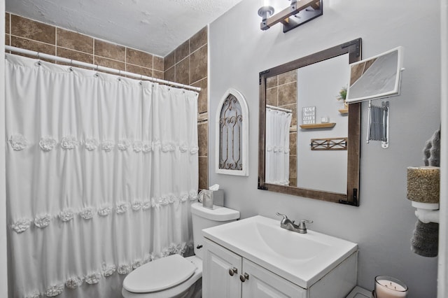 4812-4814 Idaho Ave N, Crystal, MN 55428 - full bath with toilet, a tile shower, vanity, and a textured ceiling