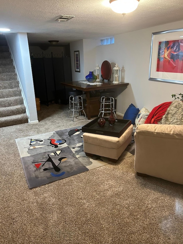 4812-4814 Idaho Ave N, Crystal, MN 55428 - living area featuring carpet flooring, stairs, and a textured ceiling