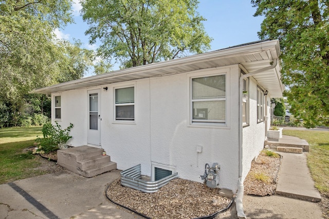 4812-4814 Idaho Ave N, Crystal, MN 55428 - view of front facade featuring a front lawn and stucco siding