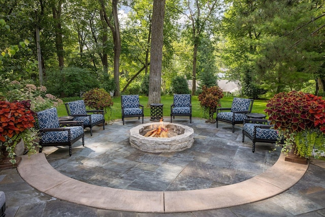 view of patio / terrace with an outdoor fire pit