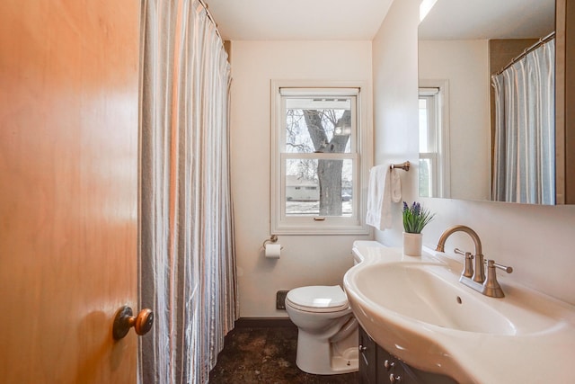 full bath with vanity and toilet