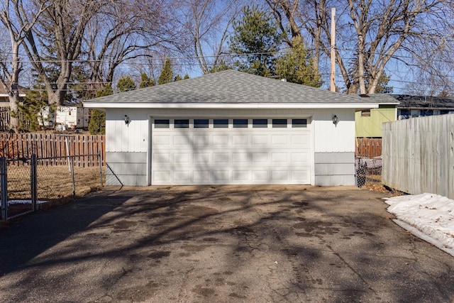 detached garage with fence