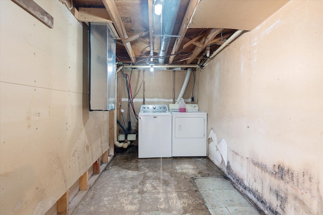 unfinished below grade area with independent washer and dryer