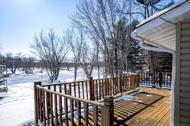 view of snow covered deck