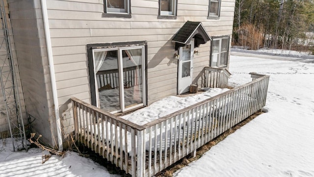 view of snow covered deck