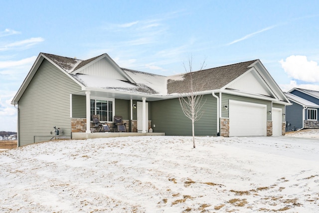 view of front of home with a garage