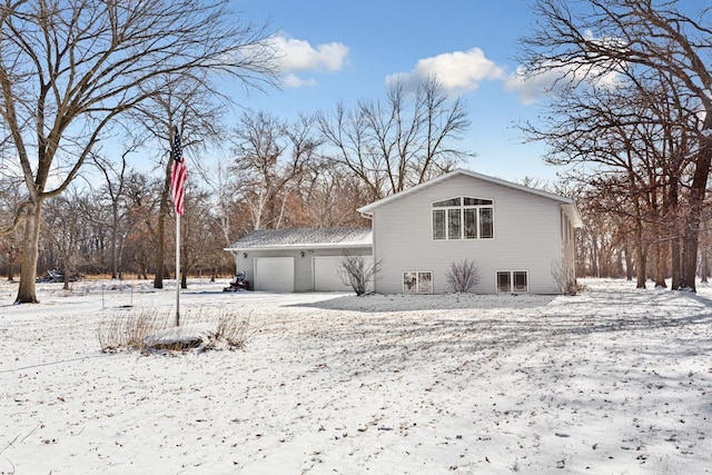 exterior space with a garage