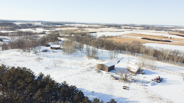 snowy aerial view with a rural view