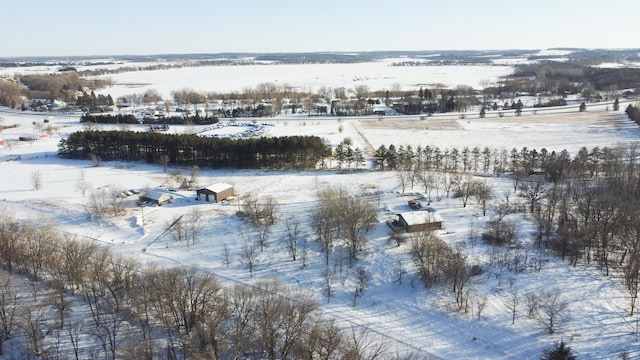 snowy aerial view with a rural view