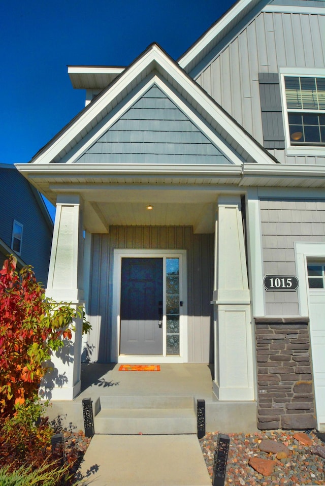 property entrance featuring covered porch