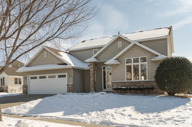 craftsman-style house featuring an attached garage