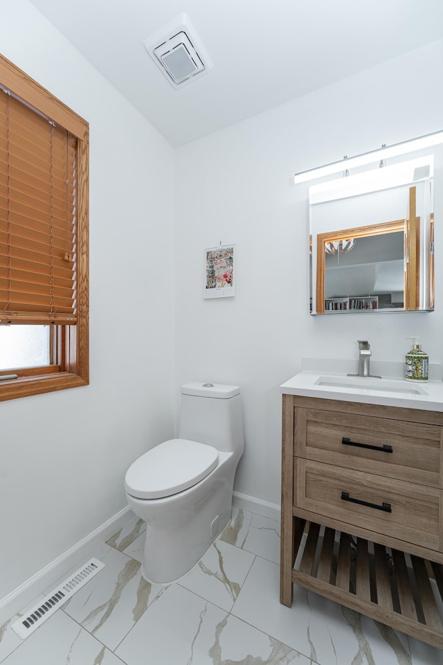 5078 Nicklaus Dr NW, Rochester, MN 55901 - bathroom featuring marble look tiles and vanity
