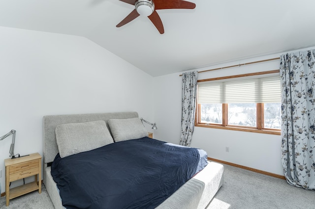5078 Nicklaus Dr NW, Rochester, MN 55901 - bedroom with vaulted ceiling, light carpet, and ceiling fan