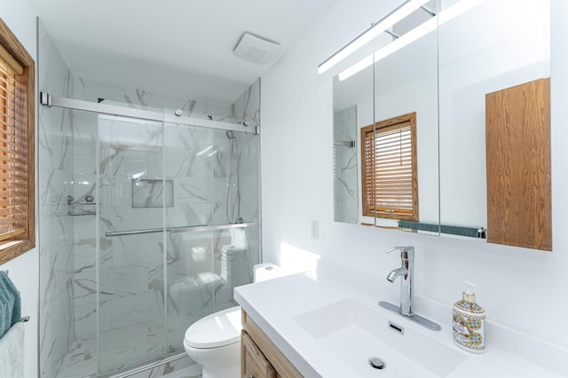 5078 Nicklaus Dr NW, Rochester, MN 55901 - bathroom featuring vanity and a marble finish shower