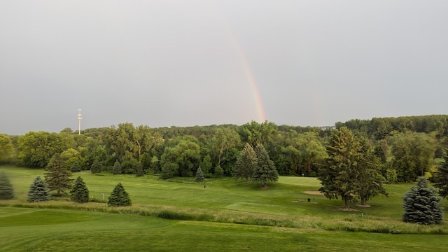 5078 Nicklaus Dr NW, Rochester, MN 55901 - surrounding community with a lawn and view of golf course