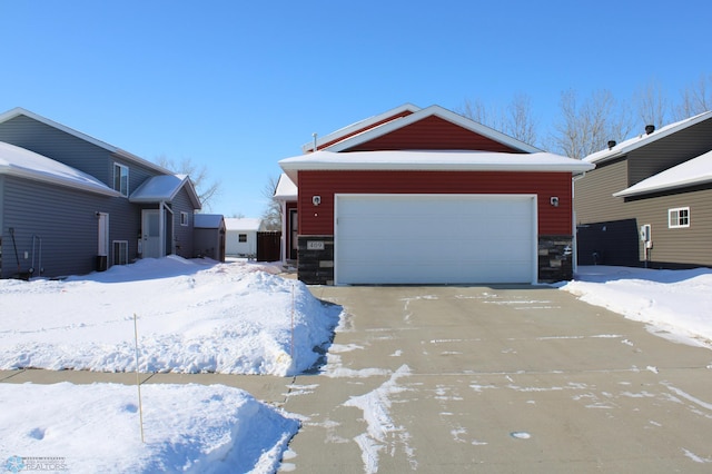 ranch-style house featuring a garage