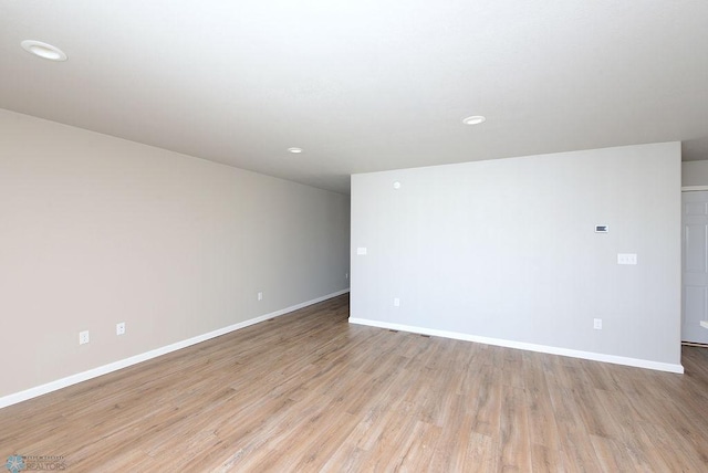 empty room featuring light hardwood / wood-style floors