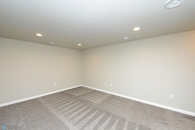 unfurnished room featuring carpet floors