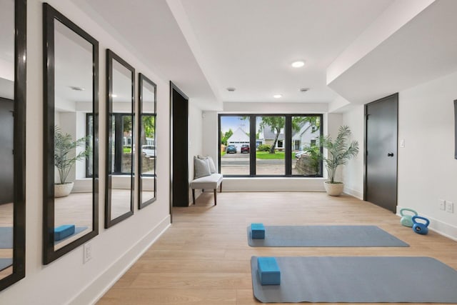 651 Sue Pl, Saint Paul, MN 55116 - exercise room with light wood-type flooring, recessed lighting, and baseboards