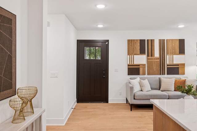 651 Sue Pl, Saint Paul, MN 55116 - foyer entrance with light wood finished floors, baseboards, and recessed lighting