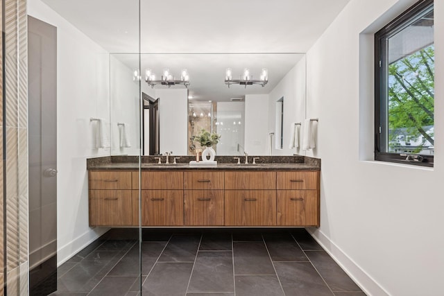 651 Sue Pl, Saint Paul, MN 55116 - full bath featuring double vanity, baseboards, and a chandelier