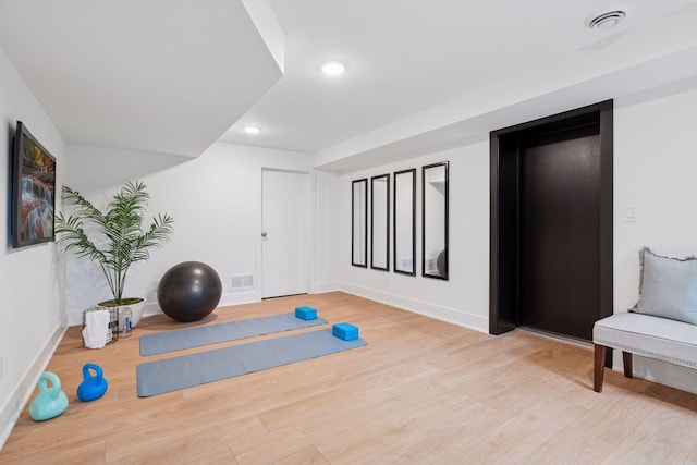 651 Sue Pl, Saint Paul, MN 55116 - exercise area with wood finished floors, baseboards, and recessed lighting