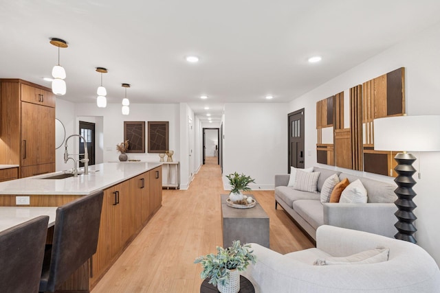 651 Sue Pl, Saint Paul, MN 55116 - living area with light wood-style floors, recessed lighting, and baseboards