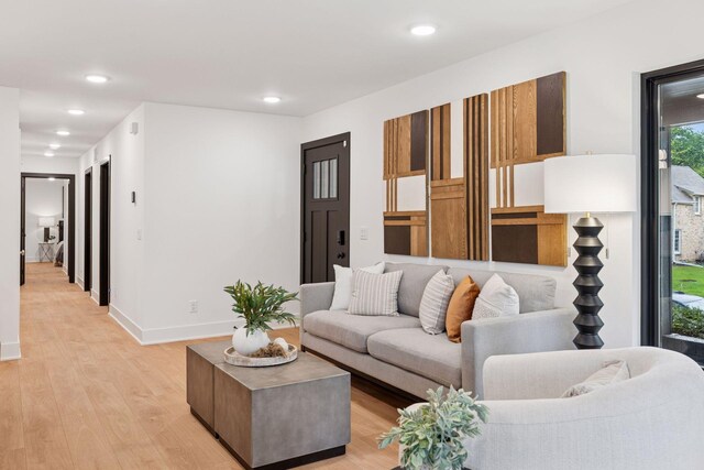 651 Sue Pl, Saint Paul, MN 55116 - living room featuring light wood-style flooring, recessed lighting, and baseboards