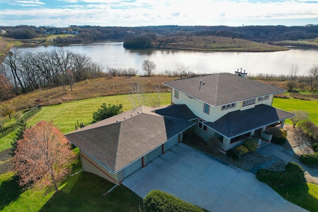 drone / aerial view with a water view