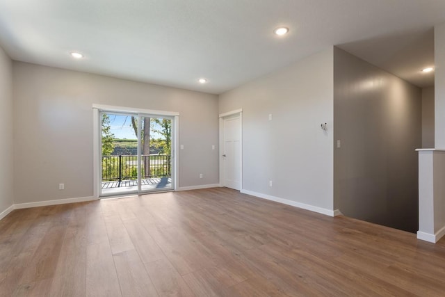 empty room featuring wood-type flooring