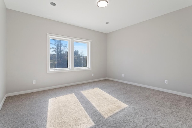 view of carpeted spare room