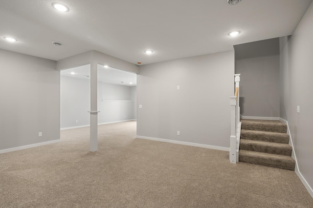 basement with light carpet