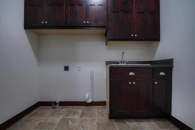 laundry room with sink, cabinets, and hookup for an electric dryer